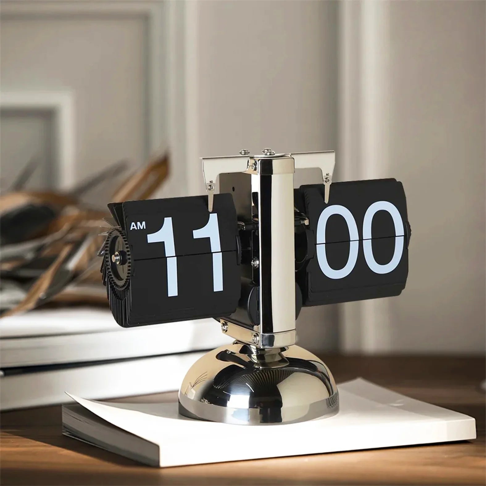 Vintage Auto Flip Clock with chrome frame and black number flaps