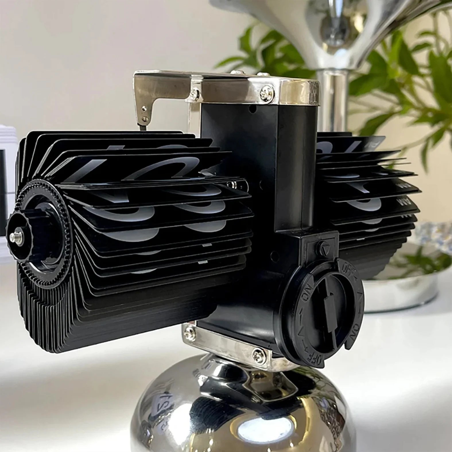 Retro mechanical flip clock styled on a tabletop