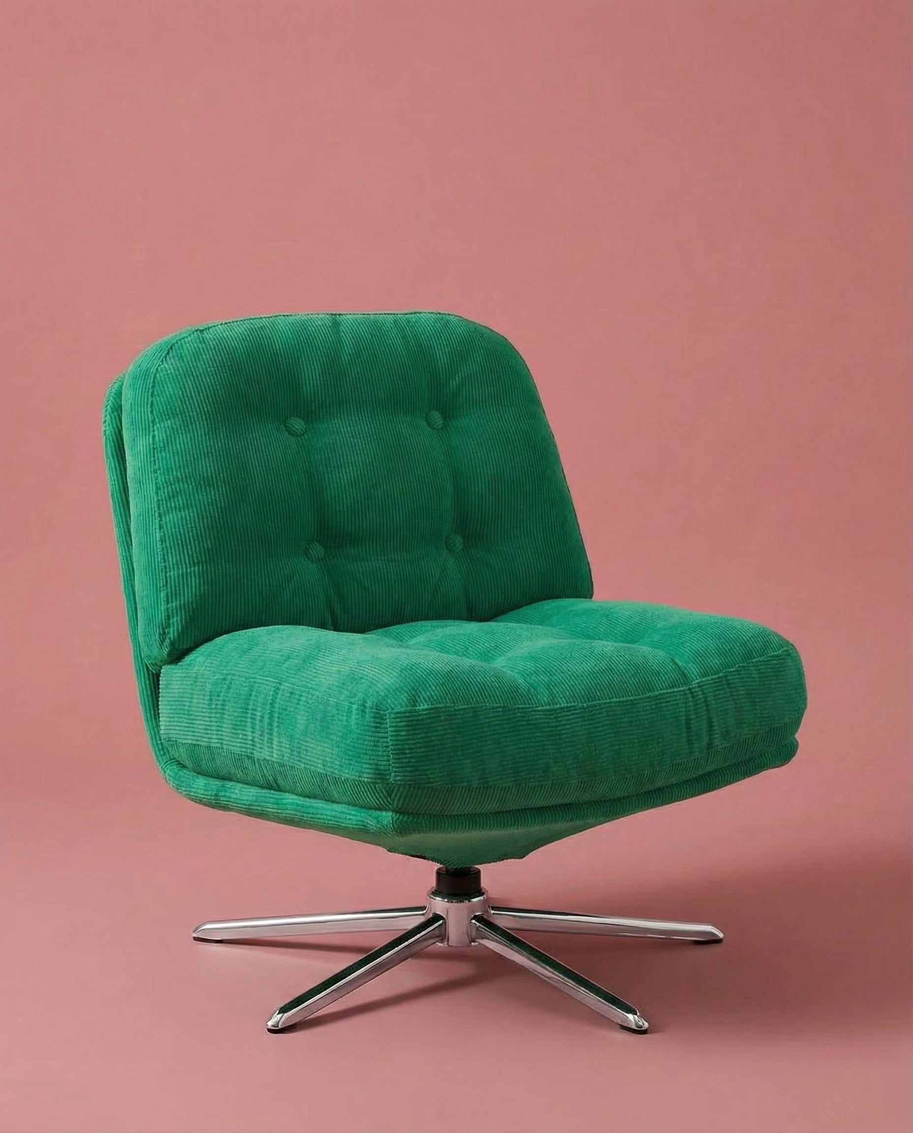 Side view of The Archive Chair in green corduroy