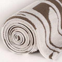 Umber Form Rug — rolled side view