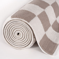 Sand Tile Rug — rolled side view