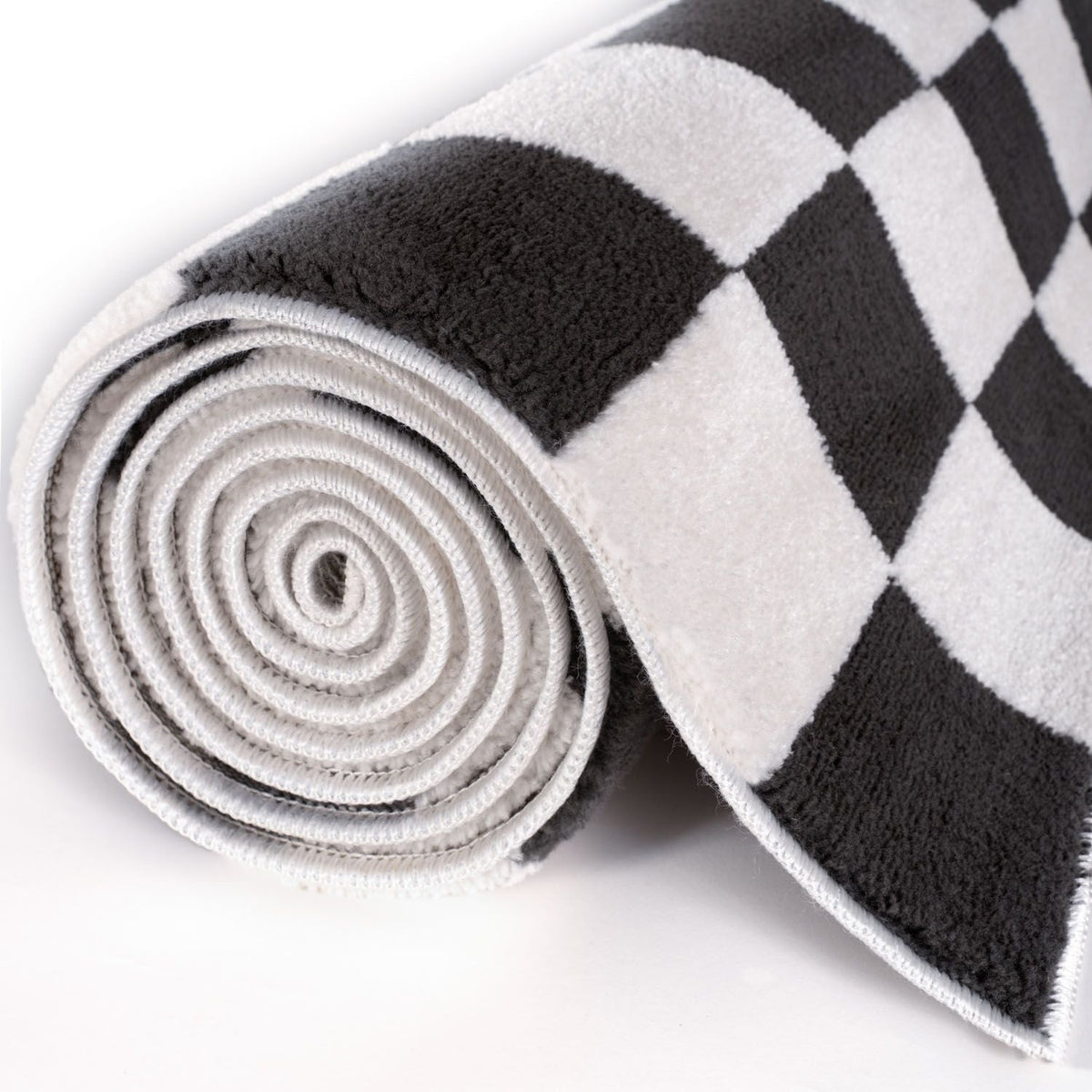 Smoke Tile Rug — rolled side view
