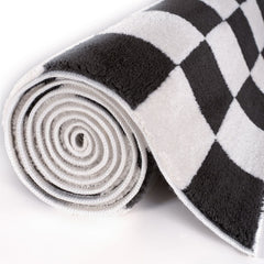 Smoke Tile Rug — rolled side view