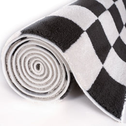 Smoke Tile Rug — rolled side view