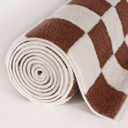 Clay Tile Rug — rolled side view