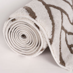 Cocoa Chevron Rug — rolled side view