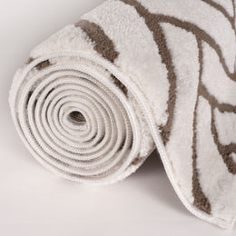 Cocoa Chevron Rug — rolled side view