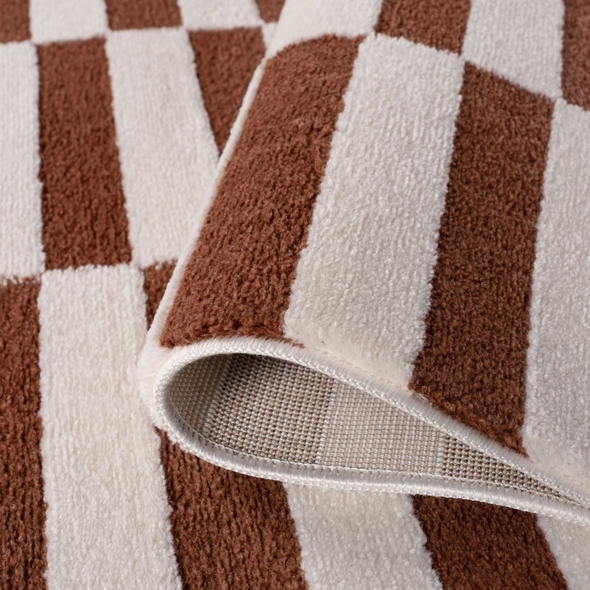 Clay Stripe Rug — folded construction detail