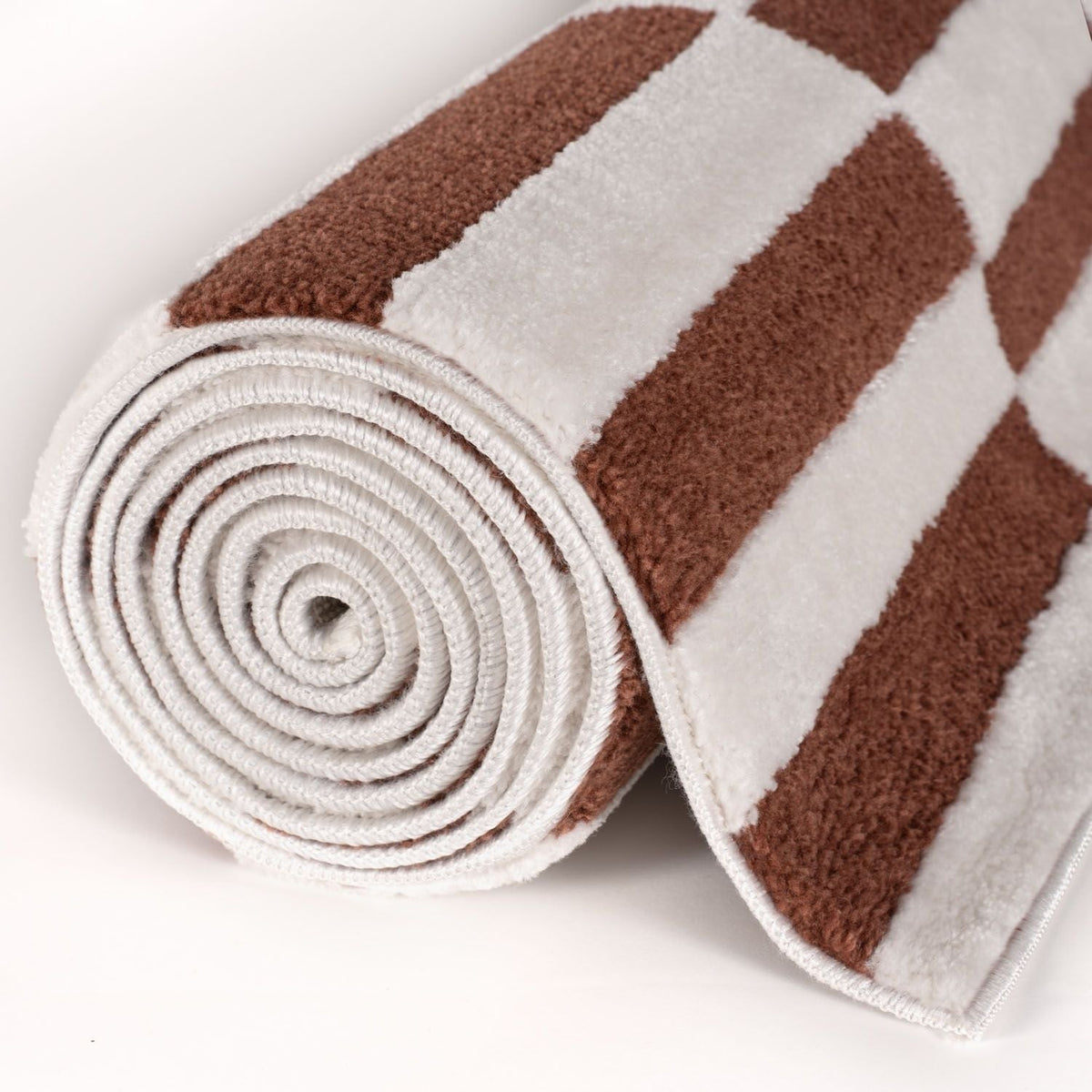 Clay Stripe Rug — rolled side view