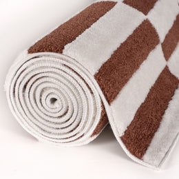Clay Stripe Rug — rolled side view