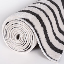 Slate Frame Rug — rolled side view