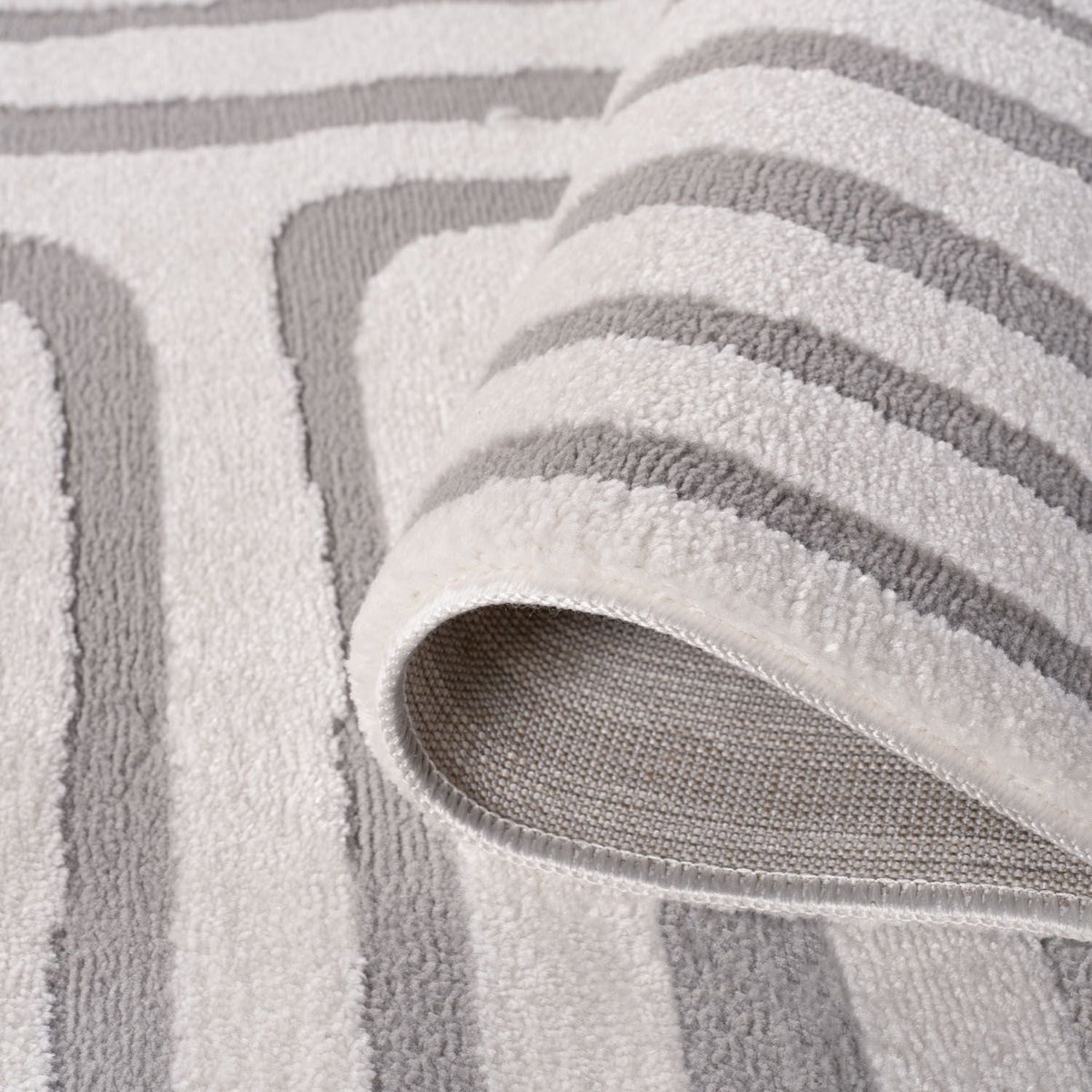 Silver Frame Rug — folded construction detail