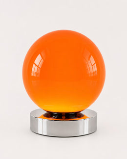 Low-profile orange globe bedside lamp with nine brightness levels