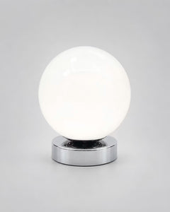Low-profile white globe bedside lamp with nine brightness levels