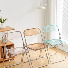 Minimal folding chair with plastic seat and electroplated steel frame