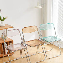 Minimal folding chair with plastic seat and electroplated steel frame