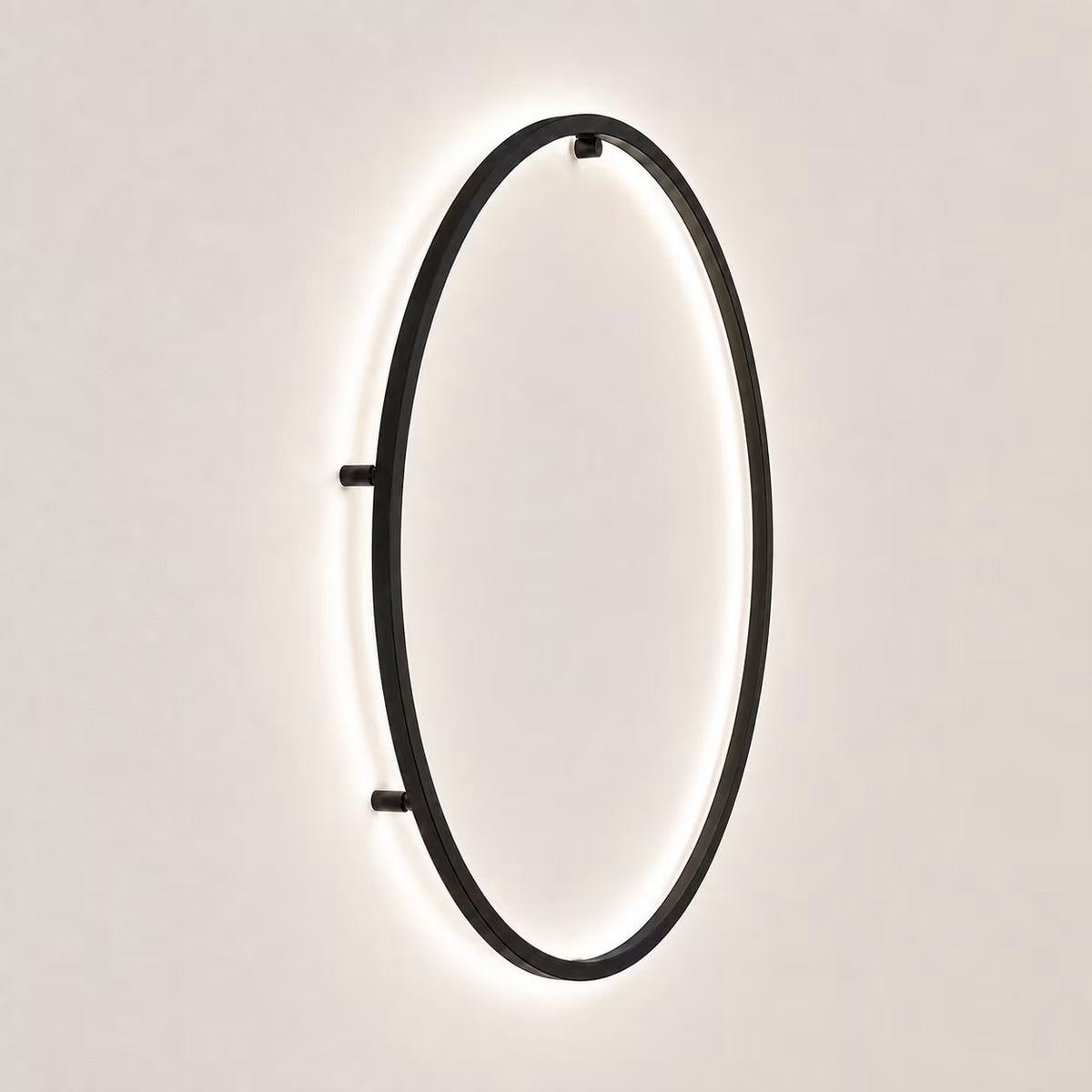 Large circular LED wall light in a modern interior