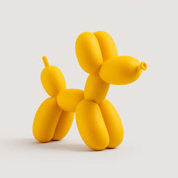 Matte resin Balloon Dog Sculpture in a styled interior