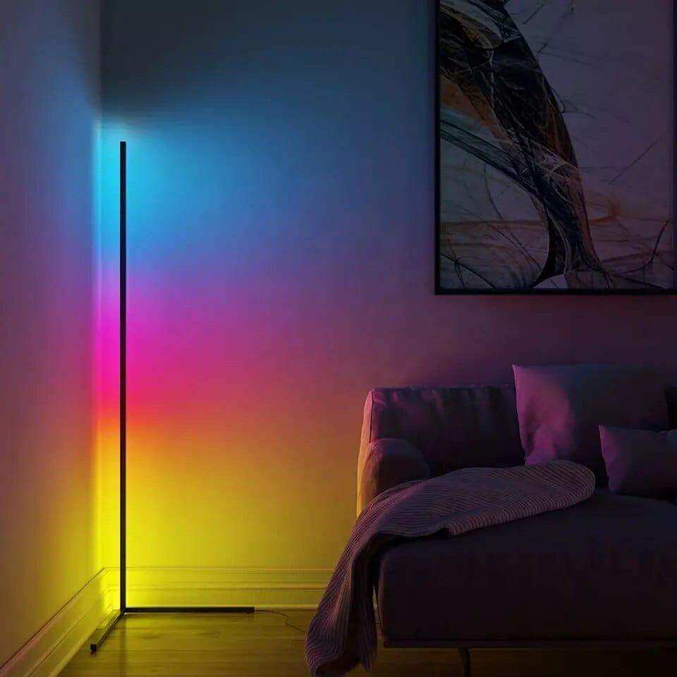 Compact RGB corner lamp creating colour along the wall