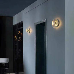 Compact 23cm glass wall lamp for dry indoor spaces
