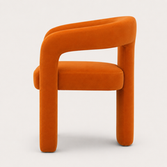 Front view of The Clementine Chair with orange velvet upholstery