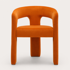 Side view showing The Clementine Chair's rounded legs and curved back