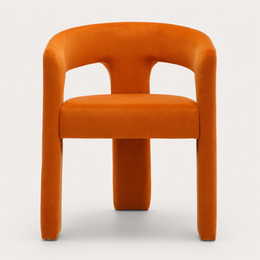 Side view showing The Clementine Chair's rounded legs and curved back