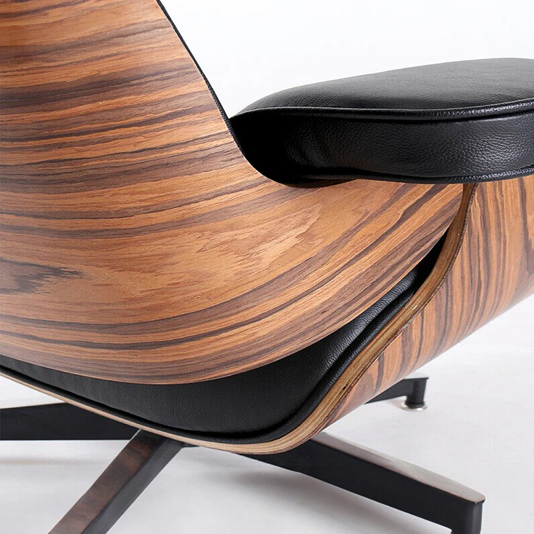 Black leather lounge chair with fixed recline and matching ottoman