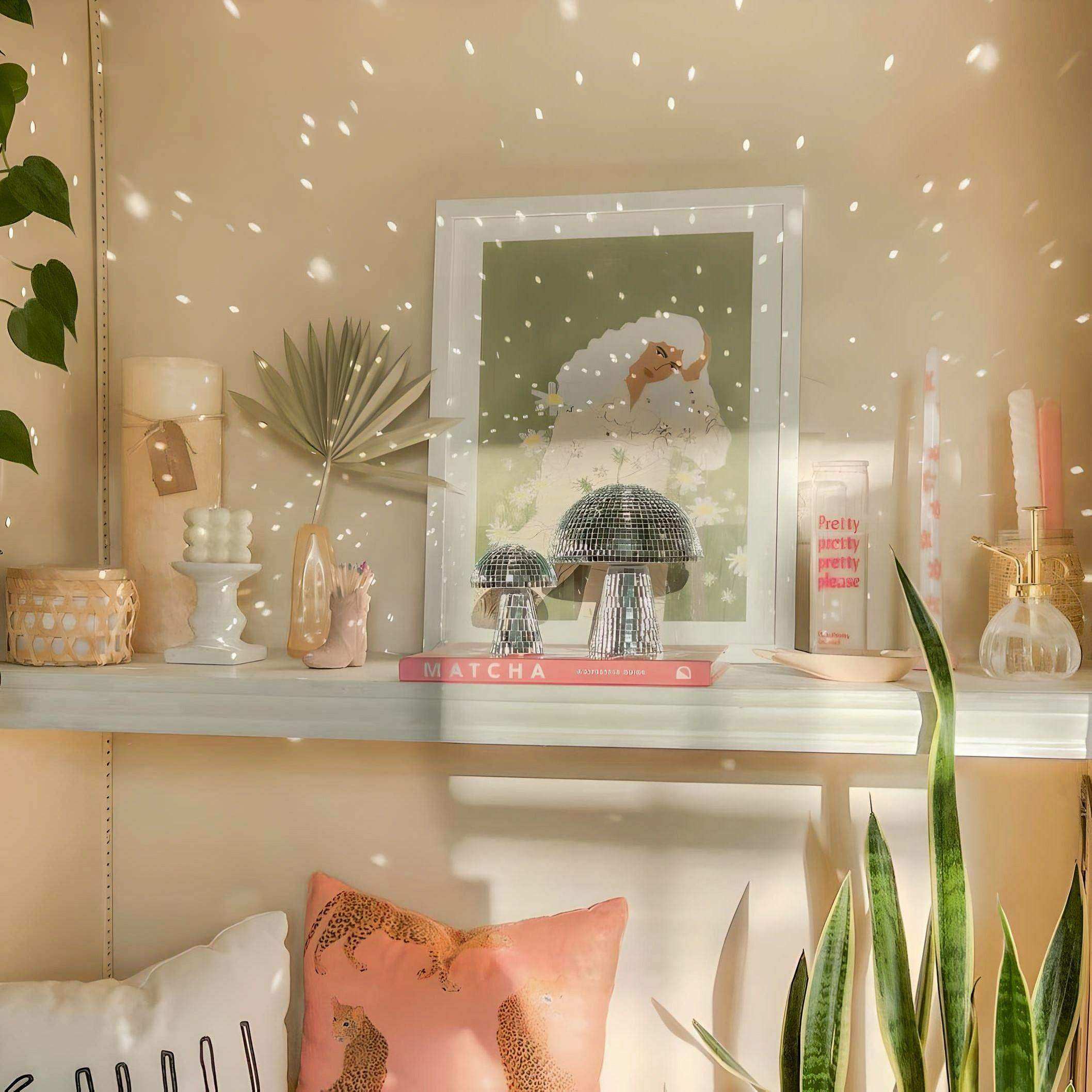 Mirrored mushroom ornaments styled together
