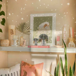 Mirrored mushroom ornaments styled together