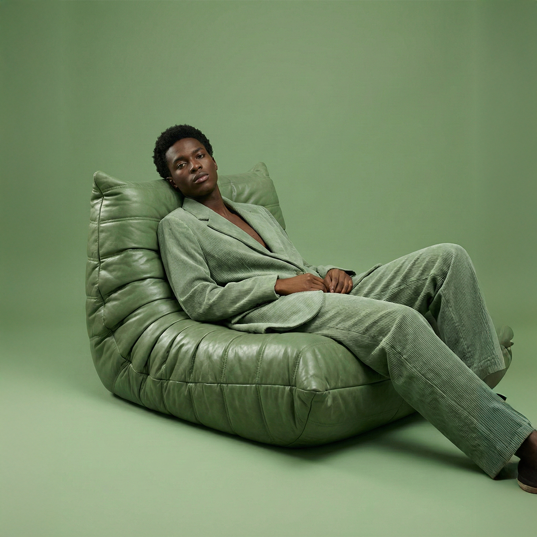 Green Caterpillar Lounger Chair in a styled interior