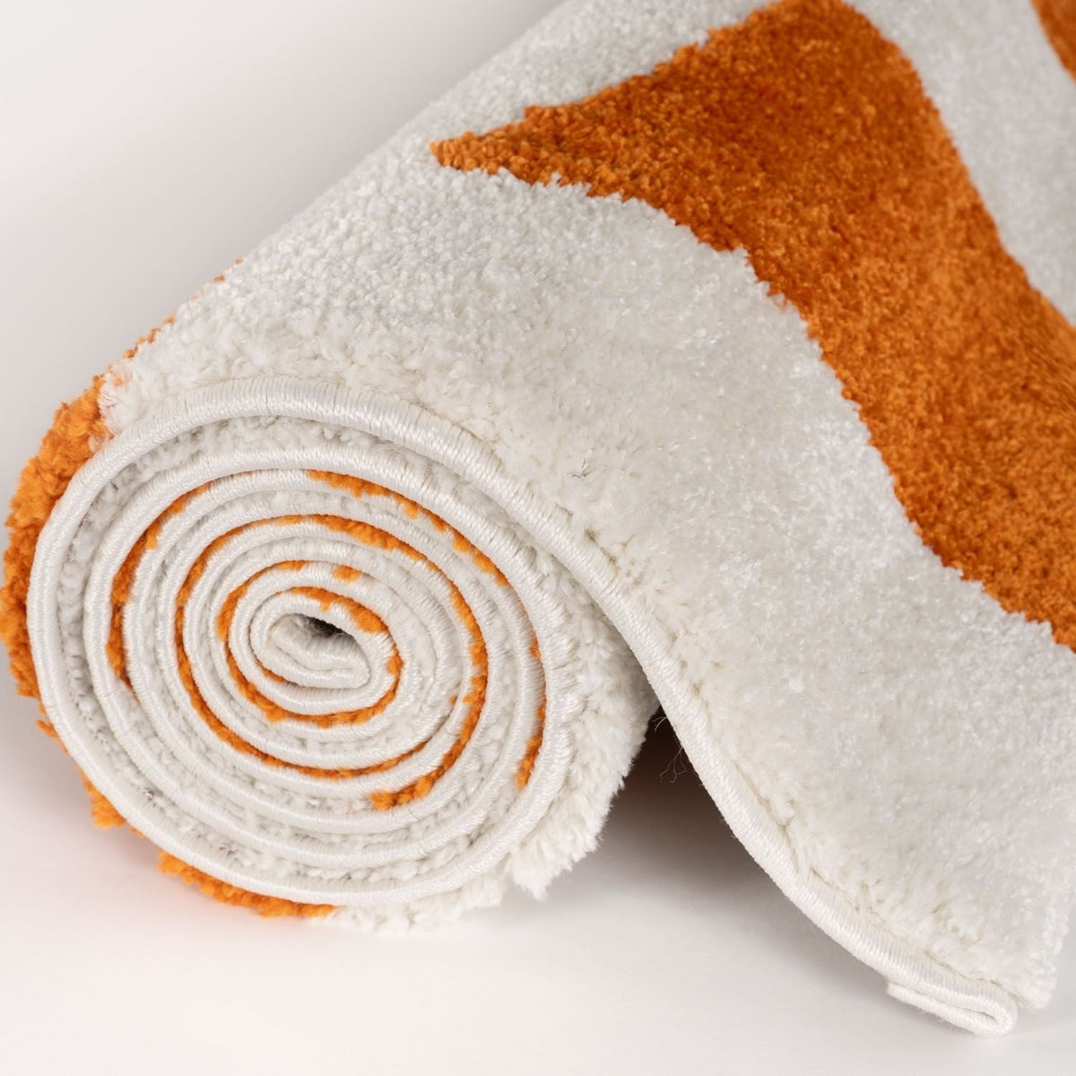 Sorrento Check Rug — rolled side view