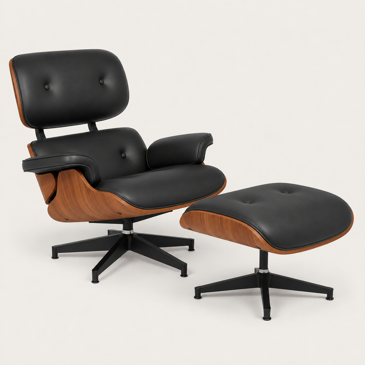 The Vesper Lounge Chair and matching ottoman in black leather-look upholstery