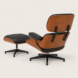 Rear three-quarter view showing the curved walnut-effect chair shell