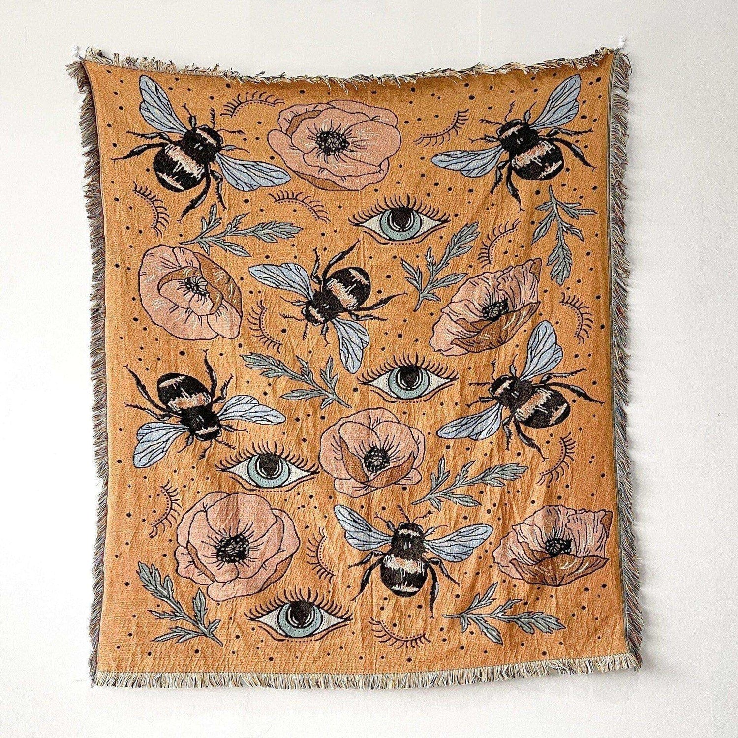 Cotton Bumble Bee throw featuring bees, eye motifs and florals