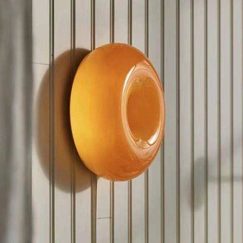 Freestanding sculptural LED lamp with circular design
