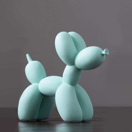 Balloon Dog Sculpture shown on a shelf